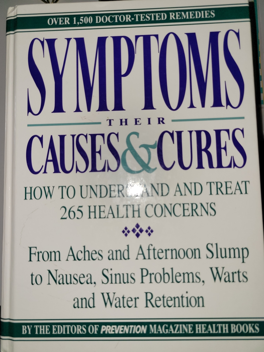 Symptoms: Their Causes & Cures - White Hardcover Health Guide